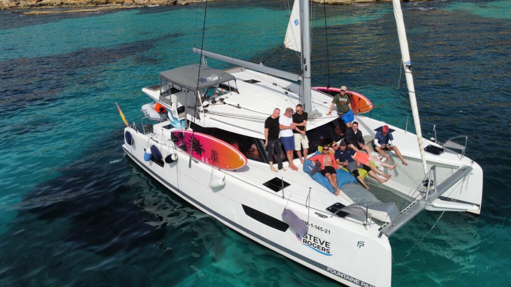 group foto from above on the catamaran during the Luxury Catamaran Tour Mallorca starting in Palma, Boat Tours Mallorca 2025