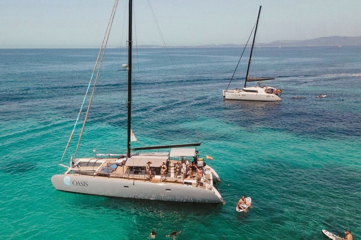 Catamaran sailing in Mallorca through the Bay of Palma with BBQ
