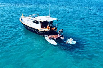 Palma Mallorca Shared All-incl Luxury Boat Trip | Sup and Snorkel, water-activities, Ses Illetes · Palma, Mallorca, photo 4, Our swimplatform makes it easy to get in and out of the water