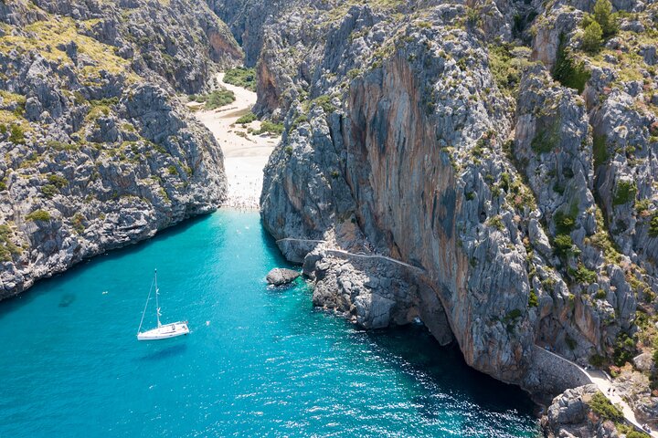 Scenic tour by Train, Tram and Boat through the lakes, water-activities, Sa Calobra · Sóller, Mallorca