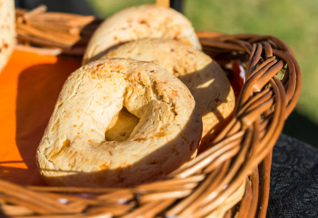 Traditional Mallorcan bread rolls in a rustic basket at the weekly market in Alaró – fresh from the island’s local bakers.